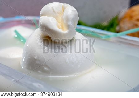 Fresh Handmade Soft Italian Cheese From Puglia, White Balls Of Burrata Or Burratina Cheese Made From