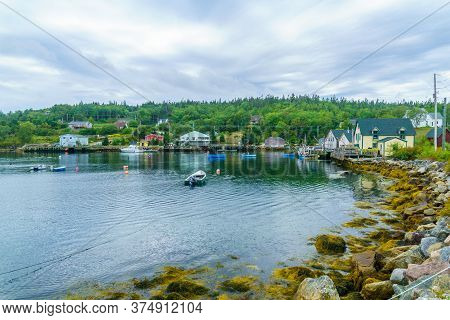 Views Of The Bay, Boats And Waterfront Buildings In Northwest Cove, Nova Scotia, Canada