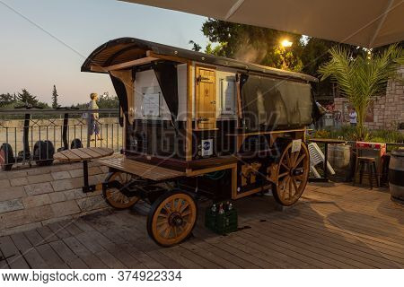 Jerusalem, Israel, June 26, 2020 : The Windmill Cafe Stands Near To The Famous Montefiore Windmill I
