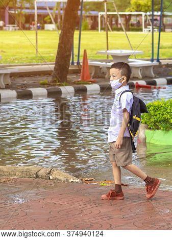 Kanchanaburi,thailand-july 2,2020:thai Students Wear Various Medical Masks To Prevent Themselves Fro