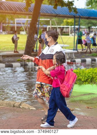 Kanchanaburi,thailand-july 2,2020:thai Students Wear Various Medical Masks To Prevent Themselves Fro
