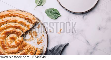 Filo Spinach And Feta Twist Pie In The Iron Pan After Oven. Authentic Greek Bakery. With Spinach, Mi