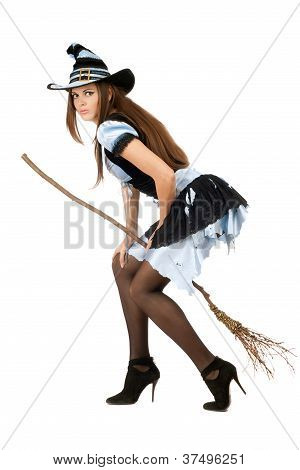 Smuk ung kvinde med en Besom