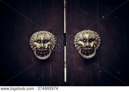 Lion door handle in Xiahao Old street in Chongqing, China.