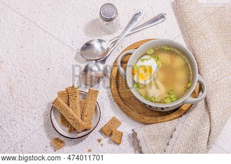 Meatball Soup With Boiled Egg, Ditalini Pasta, Vegetables And Fresh Herbs. Healthy Chicken Broth