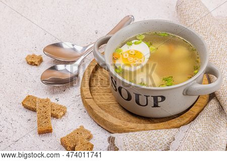 Meatball Soup With Boiled Egg, Ditalini Pasta, Vegetables And Fresh Herbs. Healthy Chicken Broth