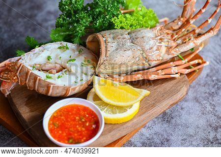 Fresh Lobster Or Rock Lobster Seafood With Herb And Spices Lemon Coriander Parsley Lettuce Salad, Sp