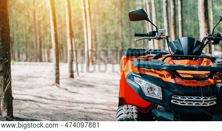 An Offroad Journey Through The Desert On A Summer Evening, With An Atv And Utv Crossing Sand Dunes A