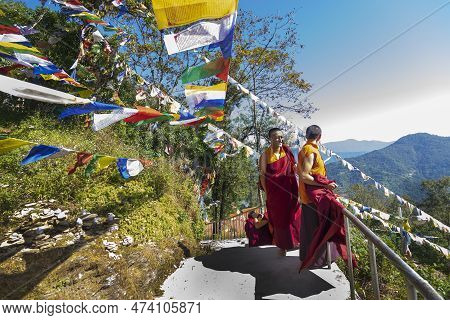 Samdruptse Monastery, Ravangla, Sikkim, India - October 20, 2016 : Happy Monks Laughing, Flying Colo