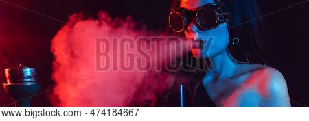 Hookah Atmosphere. The Girl Enjoys Smoking A Hookah, Sheesha. Surrealism. Horizontal Wide Photo Subt