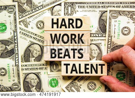 Hard Work Beats Talent Symbol. Concept Words Hard Work Beats Talent On Wooden Block. Beautiful Backg