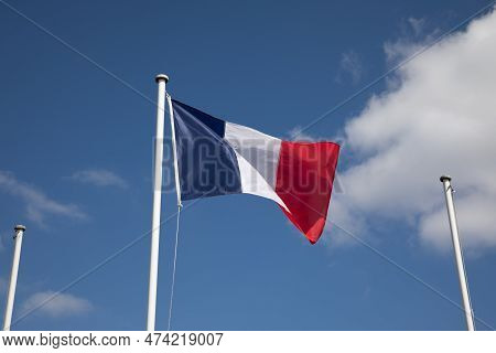 French Flag At The Top Of A Mast Floats In The Wind With Two Other Empty Masts For Mockup Country Fl