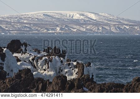 Russia. Far East, Kuril Islands. Very Hard And Sharp Basalt Rocks Along The Coast Of The Sea Of Okho