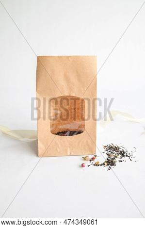 Craft Bags For Packaging Tea, Coffee, Sweets. Top View. Place For Text And Logo. Nateral Background.