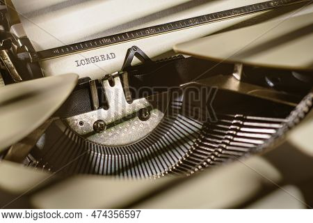 Longread Typed Words On A Vintage Typewriter. Close Up Shot Of Simple And Powerful Message.