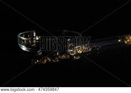 Still Life With Soft Translucent Gelatin Capsules Of Golden Color With Essential Oils, Omega-3 Or Fa