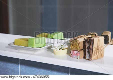 Still Life Composition With Handmade Natural Organic Soap Bars, Solid Shampoos, Hair Conditioner And
