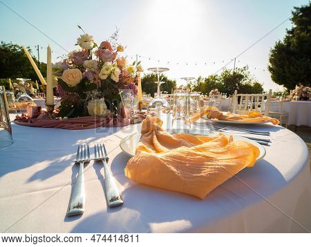 Wedding Banquet Concept. Chairs And Round Table For Guests, Served With Cutler And, Flowers And Croc