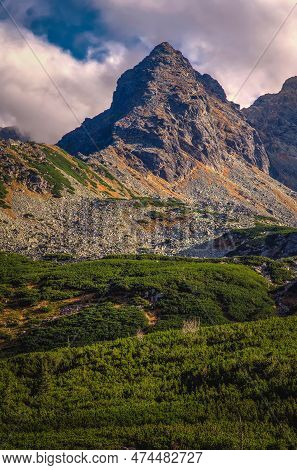 Beautiful Summer Holiday View On A Mountain Trail. Characteristic Beautiful Peak Called Koscielec In