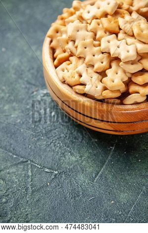 Front Close View Little Crackers Inside Plate On A Dark Background Crisp Snack Salt Bread Rusk Food 