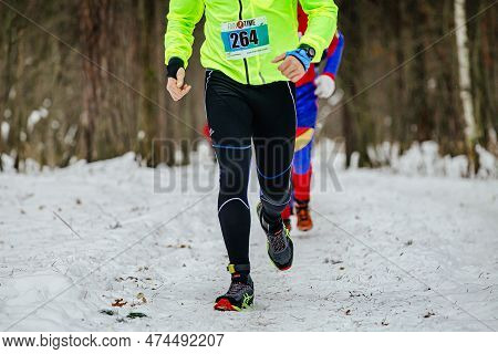 Ekaterinburg, Russia - November 26: Male Runner Run Winter Trail Race In Leggings Kalenji And Asics 