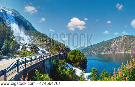 Summer Mountain Langfossen Waterfall On Slope (etne, Norway).