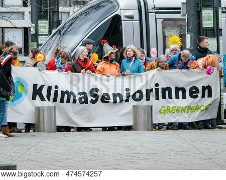 Strasbourg, France - Mar 29, 2023: A Group Of Determined Swiss Seniors Peacefully Protest In Front O