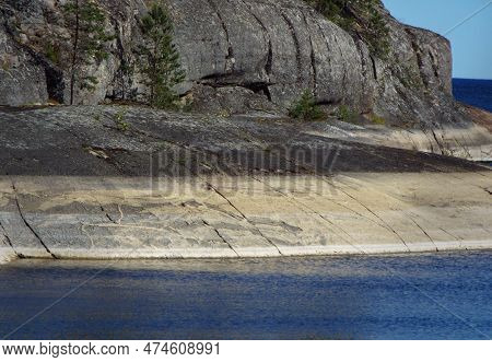 Scenery. Russia. Karelia. Karelian Skerries. Lake Ladoga. Channel Of Lake Ladoga With Stony Banks. N