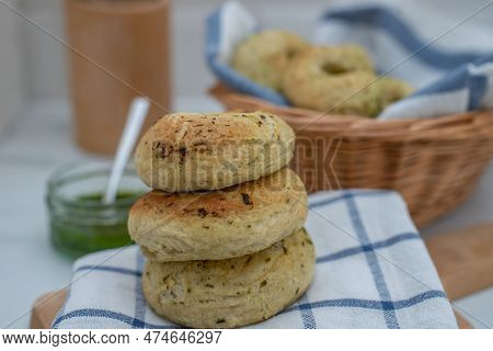 Home Made Whole Grain Bagels With Wild Garic On A Table
