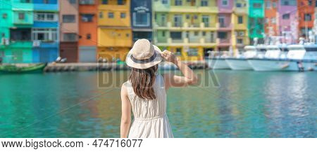 Woman Traveler Visiting In Taiwan, Tourist With Hat Sightseeing In Keelung, Colorful Zhengbin Fishin