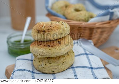 Home Made Whole Grain Bagels With Wild Garic On A Table