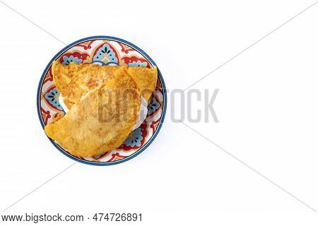 Traditional Venezuelan Beef Cachapa Isolated On White Background. Top View. Copy Space