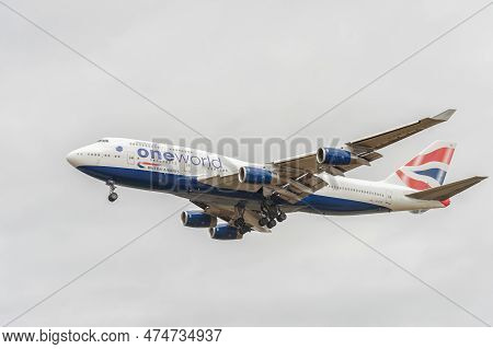 London, England - August 22, 2016: G-civp British Airways Boeing 747 Oneworld Livery Landing In Inte