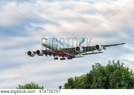 London, England - August 22, 2016: A6-een Emirates Airlines Airbus A380 Landing In London Heathrow I