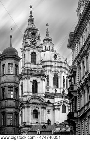 Black And White Vertical Shot Of Historical St.nicholas Church In The Historical Center Of Prague. B