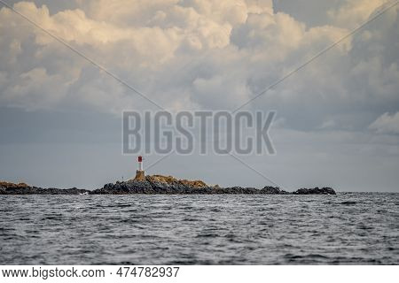 Hudson Rocks Red And White Seamark In The Strait Of Georgia, Vancouver Island, British Columbia, Can