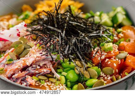 Portion Of Salmon Poke Bowl With Vegetables