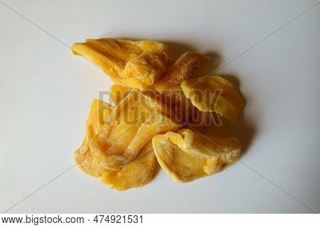Close Shot Of Heap Of Fleshy Yellow Dried Jack Fruit Chips