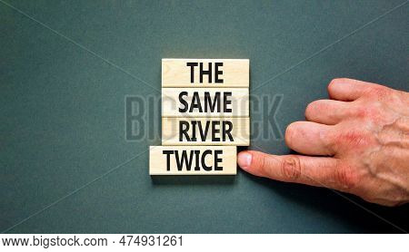 The Same River Twice Symbol. Concept Words The Same River Twice On Wooden Block. Beautiful Grey Tabl