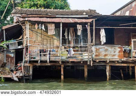 Houses At A Klong In Downtown Bangkok. Klongs Are The Canals, That Branch Off From Chao Phraya River