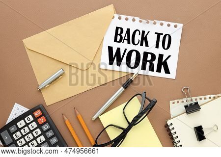 Back To Work Tyellow Sticker Calculator Pencils. Text On Paper On An Envelope
