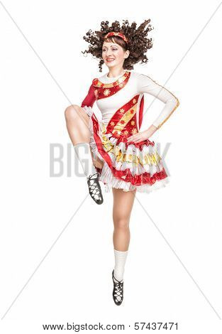 Young Woman In Irish Dance Dress Dancing Isolated