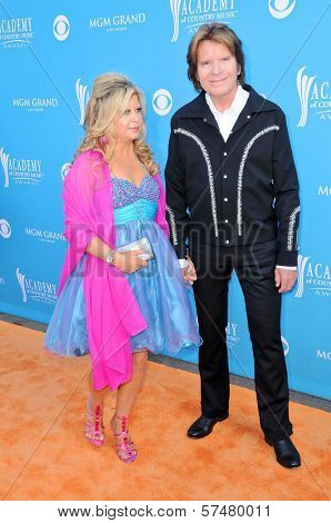 John Fogerty and Wife Julie at the 45th Academy of Country Music Awards Arrivals, MGM Grand Garden Arena, Las Vegas, NV. 04-18-10