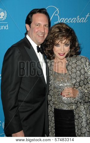Joan Collins and husband Percy Gibson at the 2009 UNICEF Ball Honoring Jerry Weintraub, Beverly Wilshire Hotel, Beverly Hills, CA. 12-10-09