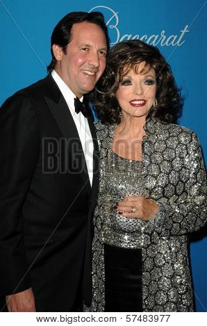 Joan Collins and husband Percy Gibson  at the 2009 UNICEF Ball Honoring Jerry Weintraub, Beverly Wilshire Hotel, Beverly Hills, CA. 12-10-09