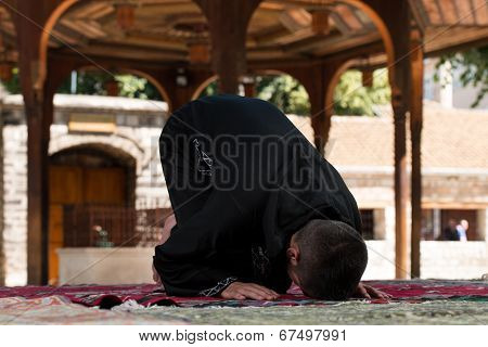 Young Muslim Guy Praying
