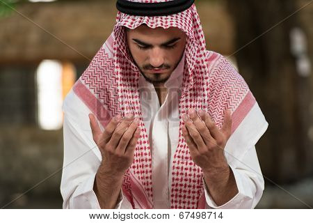 Young Muslim Guy Praying