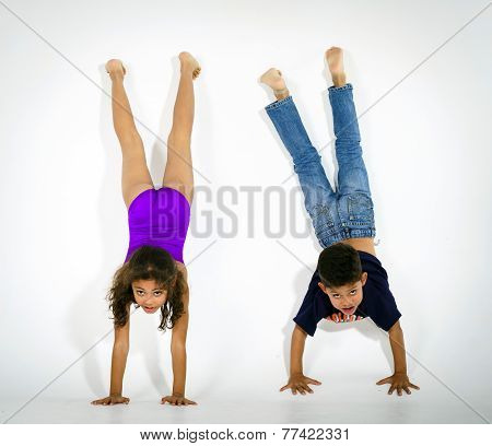 Young Active Afro-american Children Doing Gymnastics