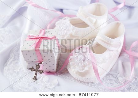Baby shoe and cross for Christening