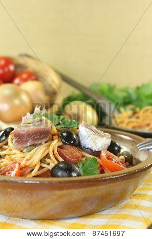 Spaghetti Alla Puttanesca With Capers And Anchovies